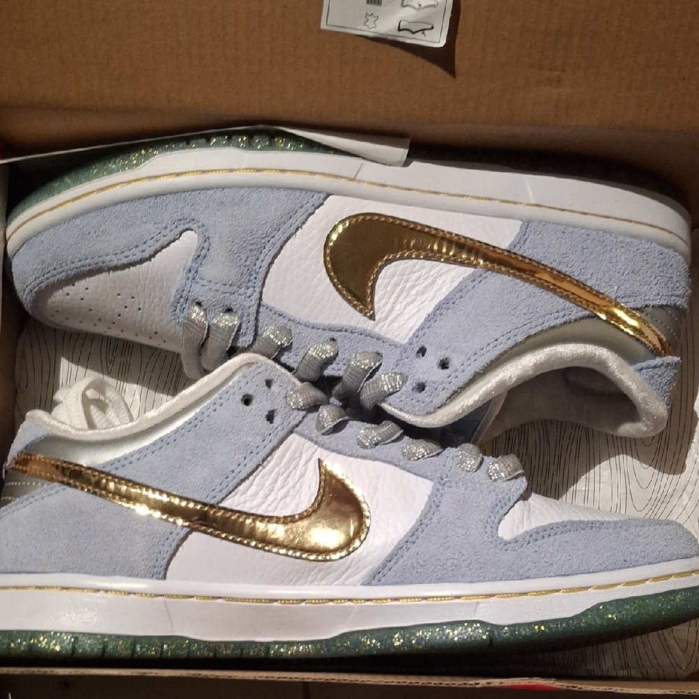 Gold and White Sneakers with Blue Accents